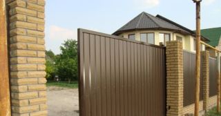 Купить откатные ворота из профнастила Тында, цена от 1788 руб.